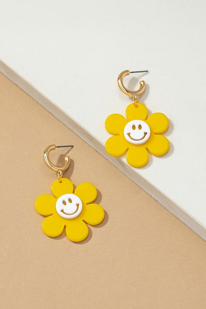 Huggie hoop dangling flower smiley face earrings