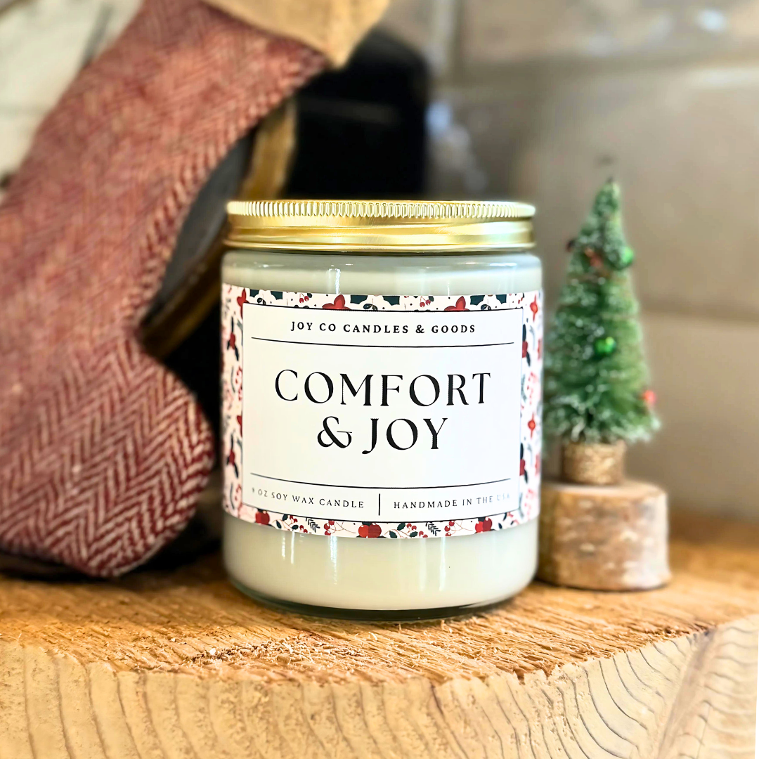 Comfort &amp; Joy Candle, Christmas Cottage Collection, Christmas Scented Candle, Christmas Gifts, Holiday Decor, 100% Soy Wax 9 oz Candle, 50 Hour Burn Time, Recyclable Clear Glass Jar, Made in the USA