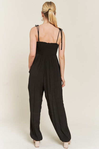 SMOCKED TIE STRAP JUMPSUIT